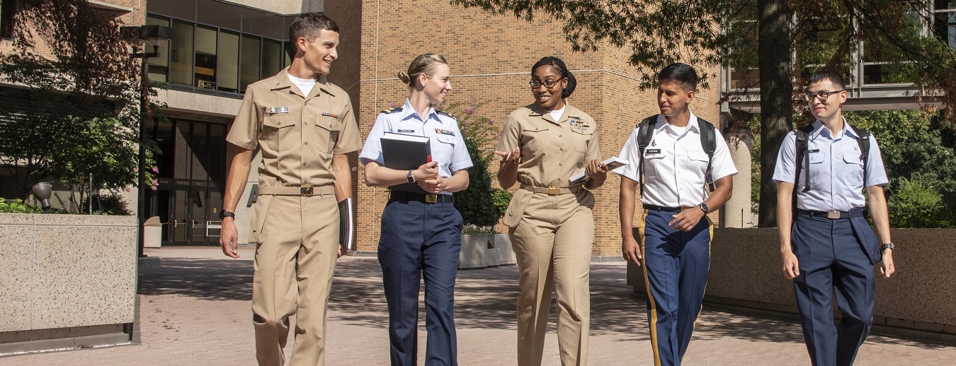 Students in uniform walking on campus